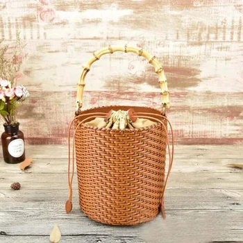 Newest Leather Woven Handbag Cowhide Casual Barrel Bag With Bamboo Handle Folk Custom Fashion Messenger Shoulder Bags For Women
Newest Leather Woven Handbag Cowhide Casual Barrel Bag With Bamboo Handle Folk Custom Fashion Messenger Shoulder Bags For Women