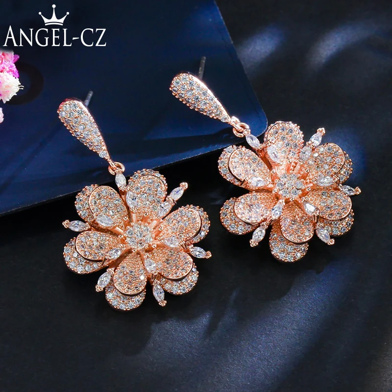 ANGELCZ Exquisite Full Micro Inlay Cubic Zircon Rose Gold Color Flower Dangle Drop Big Prom Earrings With Silver 925 Pins AE226
ANGELCZ Exquisite Full Micro Inlay Cubic Zircon Rose Gold Color Flower Dangle Drop Big Prom Earrings With Silver 925 Pins AE226
