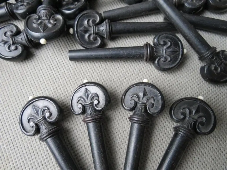 4/4 violin Fittings,4pcs carving ebony pegs.Perfect workmanship,violin part
4/4 violin Fittings,4pcs carving ebony pegs.Perfect workmanship,violin part