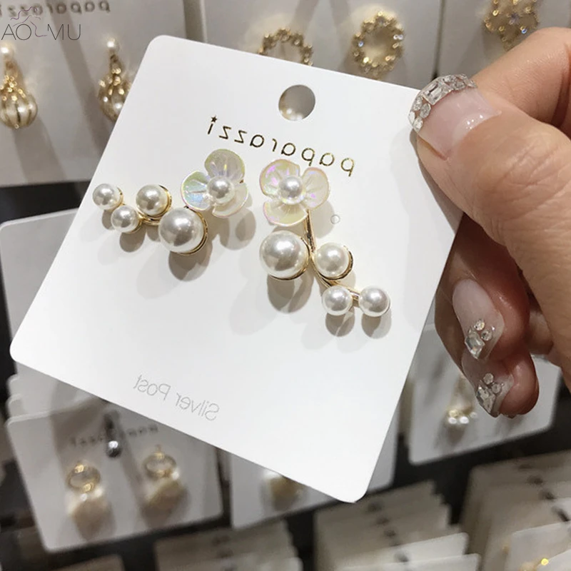 AOMU 2019 New Fashion Korean Design Sweet White Shell Flower Pearl Stud Earrings Jewelry Gift for Women Girl Party Wedding
AOMU 2019 New Fashion Korean Design Sweet White Shell Flower Pearl Stud Earrings Jewelry Gift for Women Girl Party Wedding