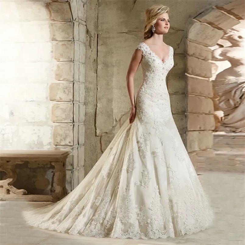Sexy V Neck Sleeveless Lace Mermaid Bridal Dress Appliqued Ivory Wedding Gowns With Beads Sequins 2019 Vintage Wedding Dress
Sexy V Neck Sleeveless Lace Mermaid Bridal Dress Appliqued Ivory Wedding Gowns With Beads Sequins 2019 Vintage Wedding Dress