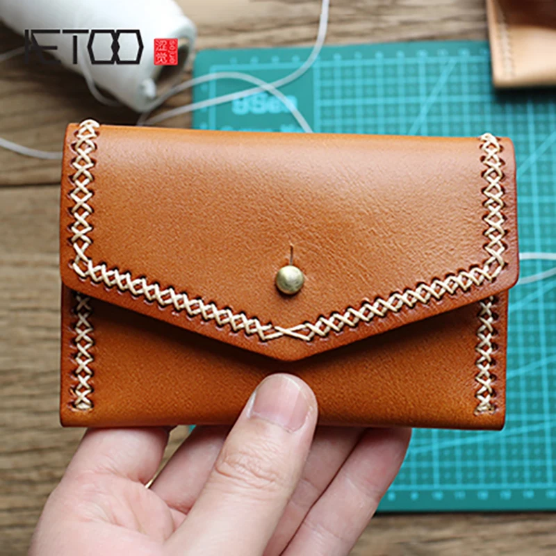 AETOO Tanning cowhide bag female car stitching handmade card bag leather driver's license retro small wallet man
AETOO Tanning cowhide bag female car stitching handmade card bag leather driver's license retro small wallet man