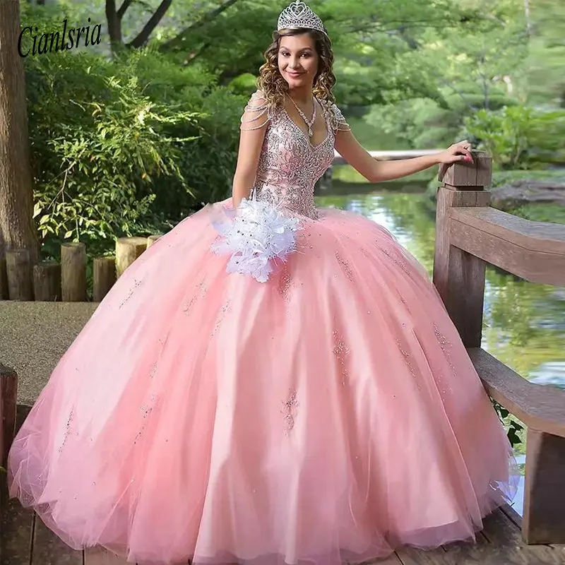 Pink Ball Gown Crystal Quinceanera Dresses 2019 V-neck Beading Ruffles Sweet 15 Dress Puffy Skirt Satin Prom Dress for Junior
Pink Ball Gown Crystal Quinceanera Dresses 2019 V-neck Beading Ruffles Sweet 15 Dress Puffy Skirt Satin Prom Dress for Junior