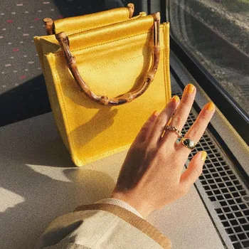 New Bamboo Ring Women's Messenger Bag High Quality Canvas Handbag Fashion silk Summer Style female
New Bamboo Ring Women's Messenger Bag High Quality Canvas Handbag Fashion silk Summer Style female