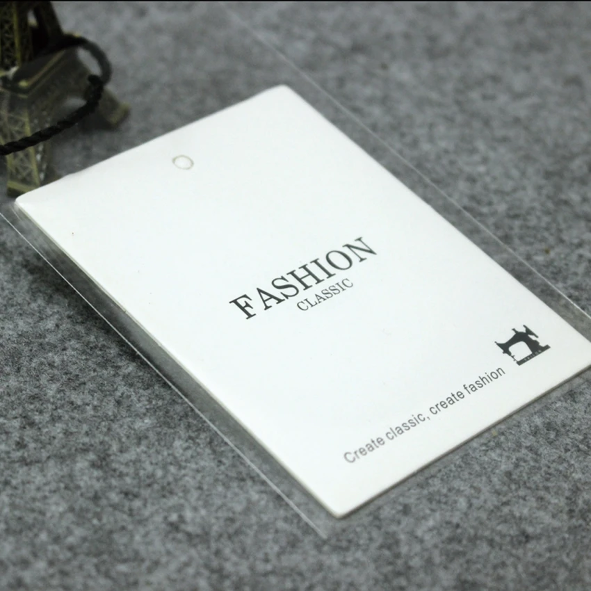 Customized garment hang tags paper tags white/printing labels/ personalized ogo clothing tags/label hang tags custom
Customized garment hang tags paper tags white/printing labels/ personalized ogo clothing tags/label hang tags custom