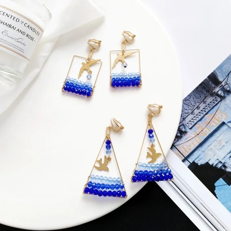 Korean Fashion Handmade Blue Sky Geometry Triangle Crystal Bead Dangle Earrings Women Girl Exquisite Creative Bird Ear Clip
Korean Fashion Handmade Blue Sky Geometry Triangle Crystal Bead Dangle Earrings Women Girl Exquisite Creative Bird Ear Clip