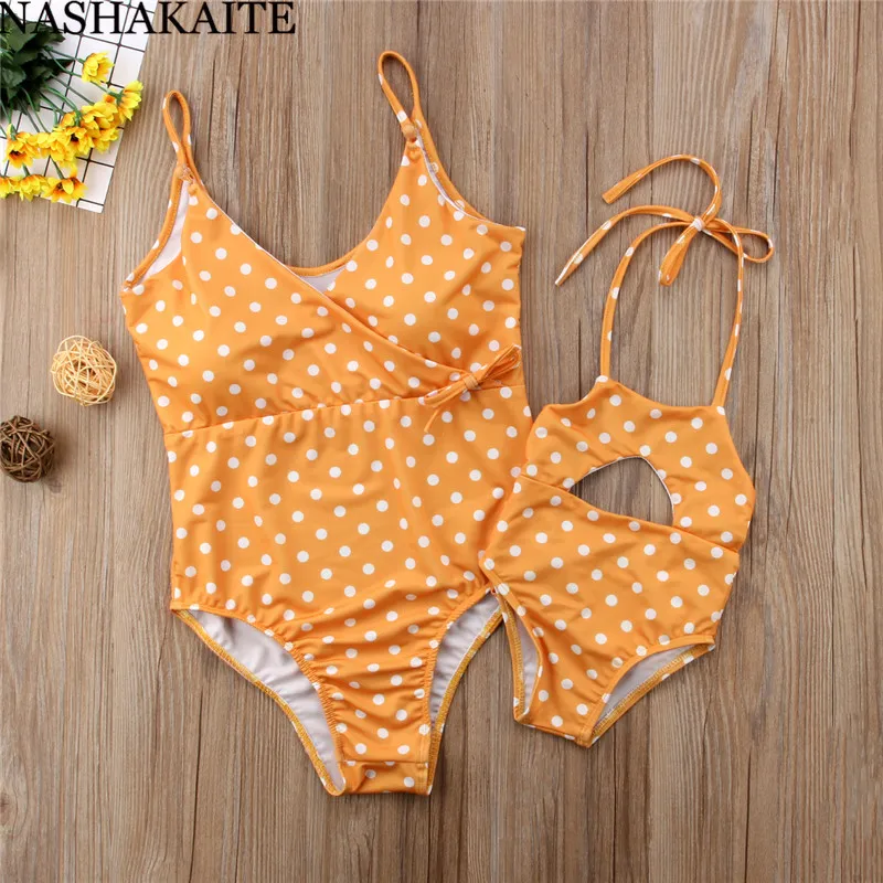 NASHAKAITE Family Look Mother Daughter Swimsuit Dots Print Waist Bandage Women Swimming Suit Mom and daughter swimwear
NASHAKAITE Family Look Mother Daughter Swimsuit Dots Print Waist Bandage Women Swimming Suit Mom and daughter swimwear