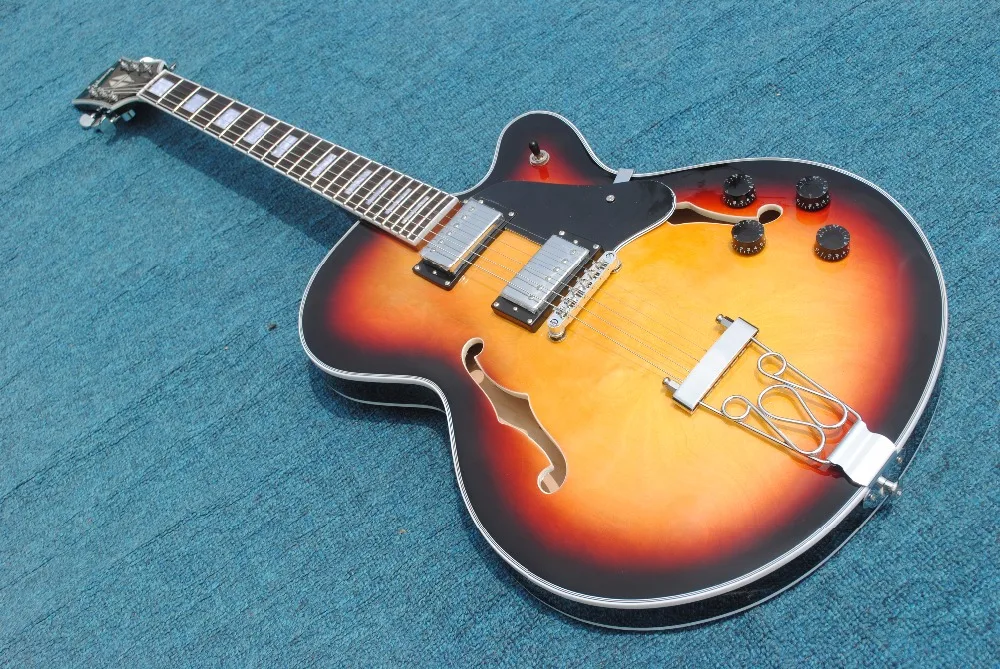 New high quality hollow body jazz electric guitar, gold hardware with drums high quality jazz guitar free shipping
New high quality hollow body jazz electric guitar, gold hardware with drums high quality jazz guitar free shipping