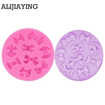 M1201 Bow tie Shape 3D fondant cake silicone mold kitchen chocolate making cupcake cake decoration tools
M1201 Bow tie Shape 3D fondant cake silicone mold kitchen chocolate making cupcake cake decoration tools
