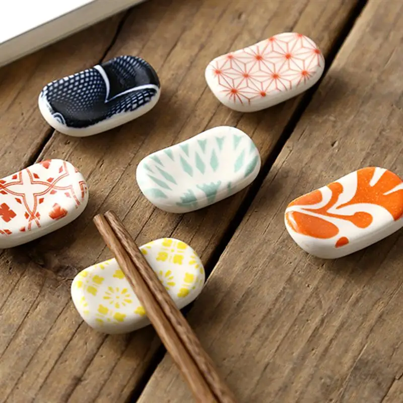 6 Pcs Japanese Style Chopstick Holder Lovely Printed Ceramic Spoon Rack Glaze Bracket Fork Knife Stand (Random Color)
6 Pcs Japanese Style Chopstick Holder Lovely Printed Ceramic Spoon Rack Glaze Bracket Fork Knife Stand (Random Color)