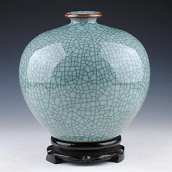 Jingdezhen antique ceramics kiln celadon vase bottle crack open pomegranate Home Furnishing decoration style
Jingdezhen antique ceramics kiln celadon vase bottle crack open pomegranate Home Furnishing decoration style