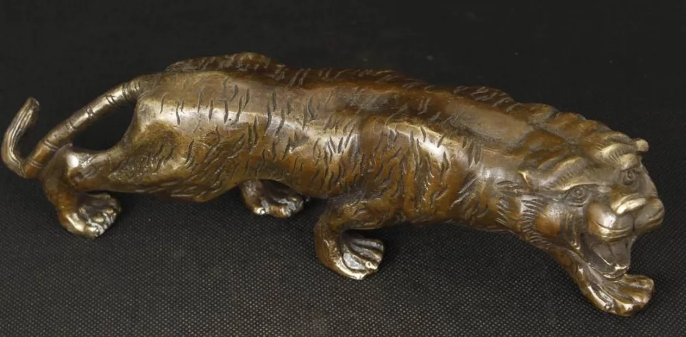 Collection Chinese Old Brass Carved Tiger Ornament Statue 23x5x7.5 cm Tibetan word copper Wholesale bronze
Collection Chinese Old Brass Carved Tiger Ornament Statue 23x5x7.5 cm Tibetan word copper Wholesale bronze