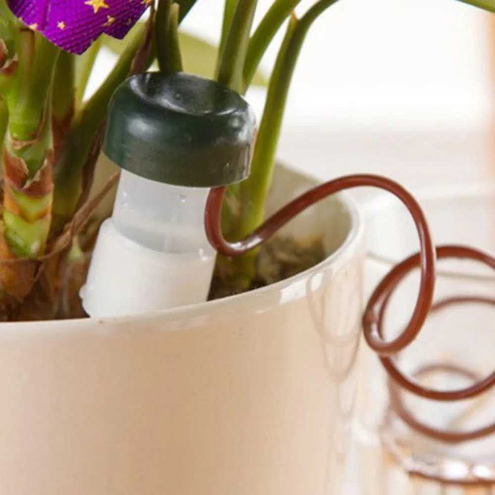 Automatic Watering Drip Irrigation System 2Pcs Home Use Flower Pot Plants Indoor Watering Drip Device Garden Tool Supplies
Automatic Watering Drip Irrigation System 2Pcs Home Use Flower Pot Plants Indoor Watering Drip Device Garden Tool Supplies