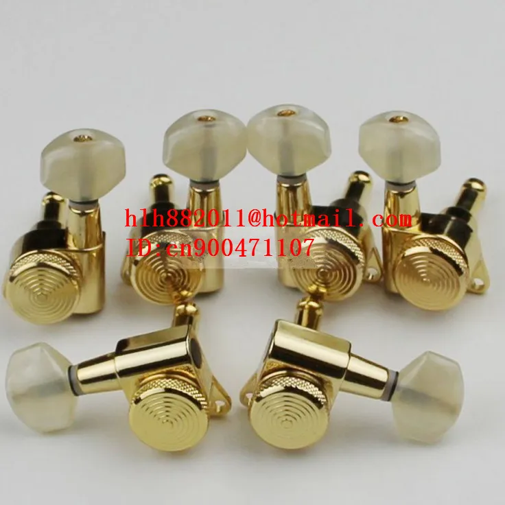 new electric guitar and acoustic guitar closed lock strings tuning peg in gold guitar button JN-07SP JN-26
new electric guitar and acoustic guitar closed lock strings tuning peg in gold guitar button JN-07SP JN-26