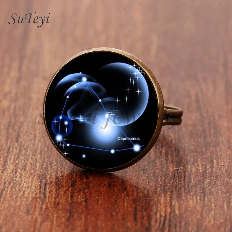SUTEYI Charms New Nouneau Capricorn Libra Scorpio Pisces Ring Constellation Pattern Glass Cabochon Rings Jewelery For Women
SUTEYI Charms New Nouneau Capricorn Libra Scorpio Pisces Ring Constellation Pattern Glass Cabochon Rings Jewelery For Women