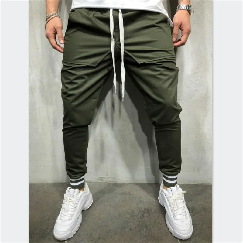 Trousers men's personality Europe and America hip-hop style solid color simple stitching cotton elastic band casual beam pants
Trousers men's personality Europe and America hip-hop style solid color simple stitching cotton elastic band casual beam pants