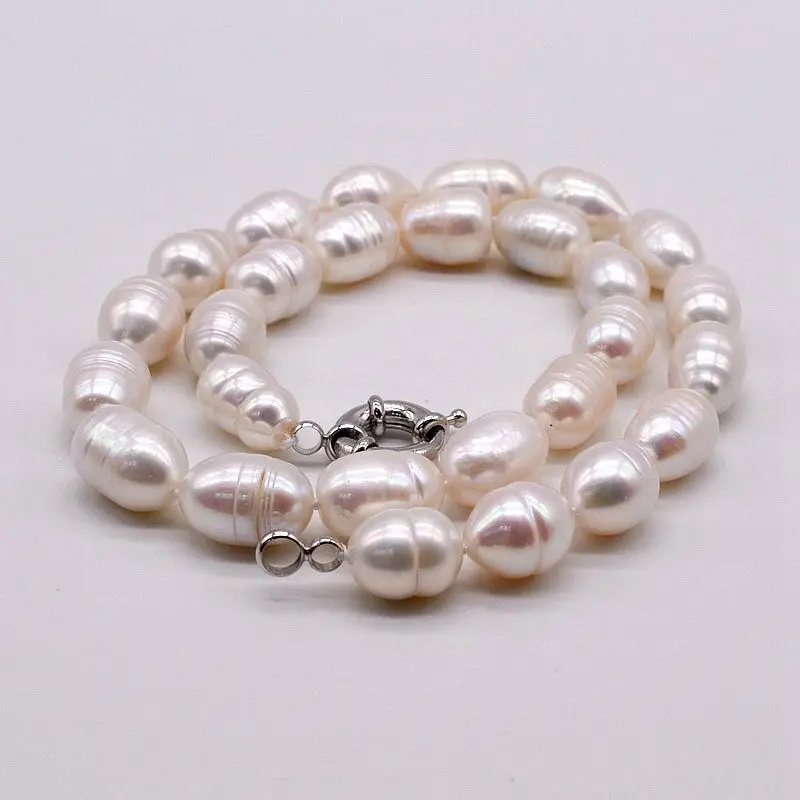 Oval white natural pearl handmade natural modeling pearl necklace classic professional clothing accessories
Oval white natural pearl handmade natural modeling pearl necklace classic professional clothing accessories