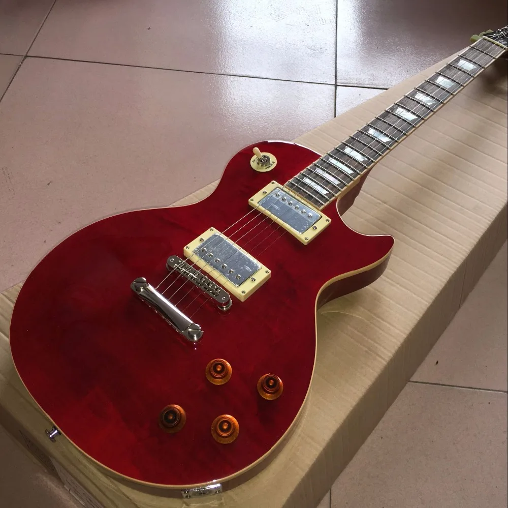 Vicers one piece body and neck electric guitar with bone nut ice cream binding and frets binding. mother pearl inlays Real
Vicers one piece body and neck electric guitar with bone nut ice cream binding and frets binding. mother pearl inlays Real