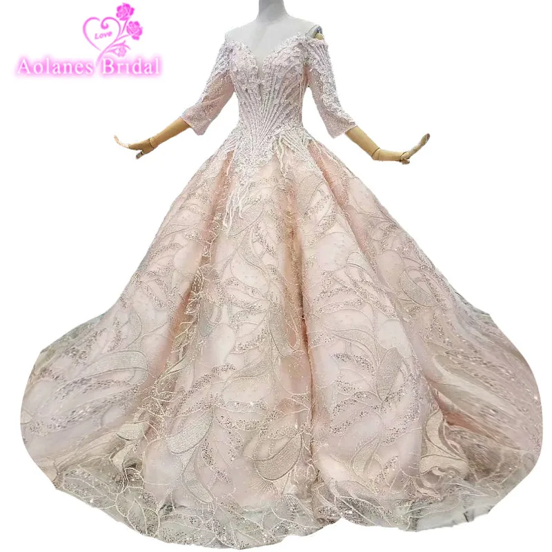 2018 Champagne Lace 3/4 Long Sleeves V-neck Court Train Bridal Gowns Backless Ball Gown Off The Shoulder Vintage Wedding Dresses
2018 Champagne Lace 3/4 Long Sleeves V-neck Court Train Bridal Gowns Backless Ball Gown Off The Shoulder Vintage Wedding Dresses