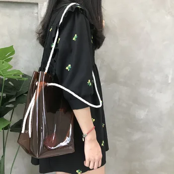 New women's bag coffee color translucent bucket bag PVC shoulder simple shopping bag large capacity Messenger bag
New women's bag coffee color translucent bucket bag PVC shoulder simple shopping bag large capacity Messenger bag