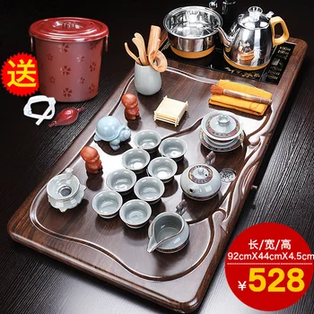 Tea tray Purple sand tea set household contracted sitting room office automatic solid wood tea tray kung fu tea set 
Tea tray Purple sand tea set household contracted sitting room office automatic solid wood tea tray kung fu tea set