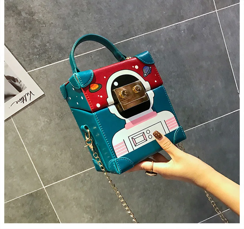 women's cartoon box handbag 2019 luxury patchwork robot shoulder bag female designer chain crossbody bag with metal buckle
women's cartoon box handbag 2019 luxury patchwork robot shoulder bag female designer chain crossbody bag with metal buckle