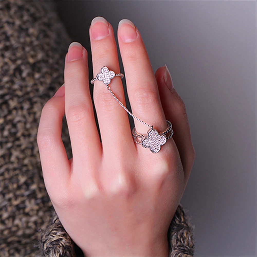 Fashionable four-leaf clover set AAA zircon white gold conjoined ring opening knuckle part ring for women Bridal Fashion Jewelry
Fashionable four-leaf clover set AAA zircon white gold conjoined ring opening knuckle part ring for women Bridal Fashion Jewelry