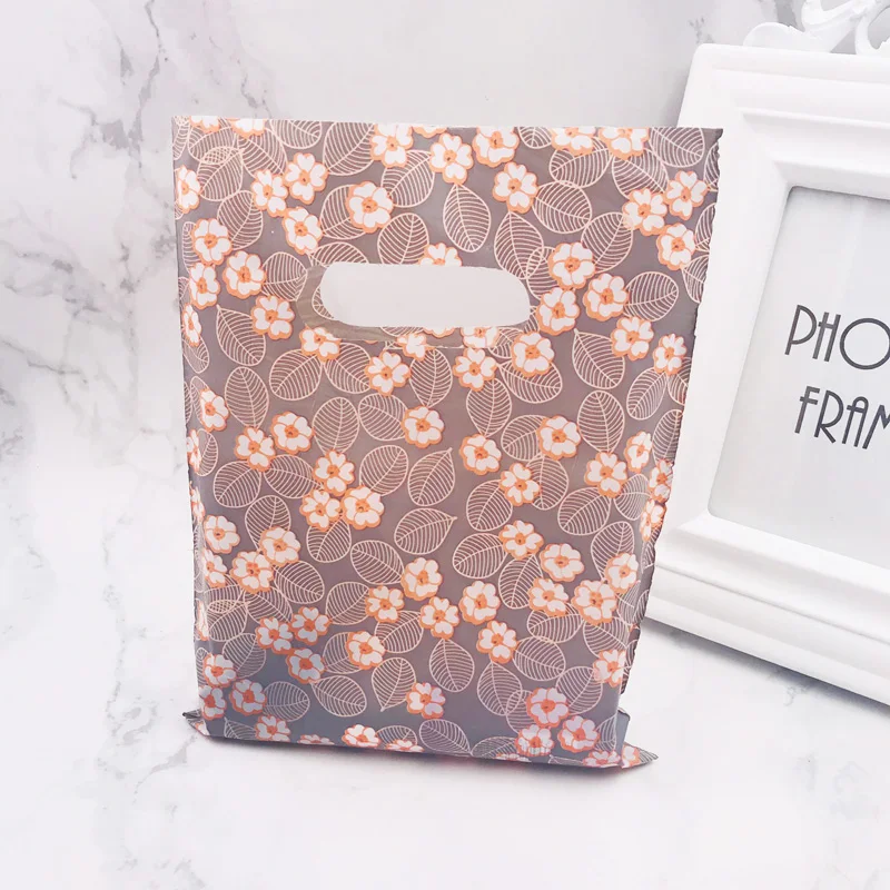 100pcs 15*20cm Gray Leaves Red Flowe Pattern Plastic Shopping Bags With Handle Jewelry Gifts Plastic Gift Bags Packaging Pouches
100pcs 15*20cm Gray Leaves Red Flowe Pattern Plastic Shopping Bags With Handle Jewelry Gifts Plastic Gift Bags Packaging Pouches