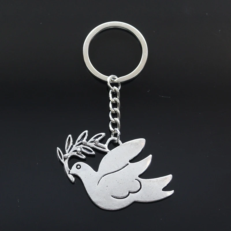 New Keychain 38x56mm peace dove with olive Pendants DIY Men Car Key Chain Ring Holder Keyring Souvenir Jewelry Gift
New Keychain 38x56mm peace dove with olive Pendants DIY Men Car Key Chain Ring Holder Keyring Souvenir Jewelry Gift