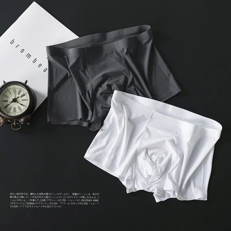 Sexy Ice Silk Men's Underwear Boxers Comfortabl Ultra Thin Seamless Man Shorts Underpants Erkek Cueca Solid Color
Sexy Ice Silk Men's Underwear Boxers Comfortabl Ultra Thin Seamless Man Shorts Underpants Erkek Cueca Solid Color