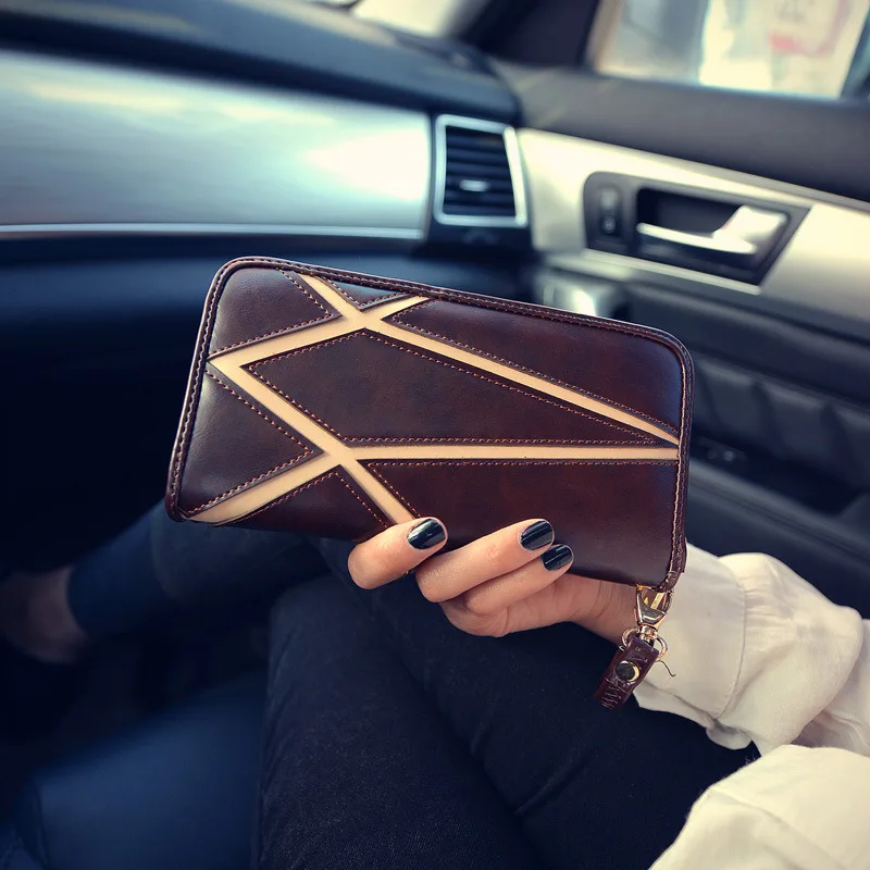 Women Leather long Money clip Zipper Wallet fashion trend new long capacity Female Spliced PU stripe lattice Holder Purse 230
Women Leather long Money clip Zipper Wallet fashion trend new long capacity Female Spliced PU stripe lattice Holder Purse 230