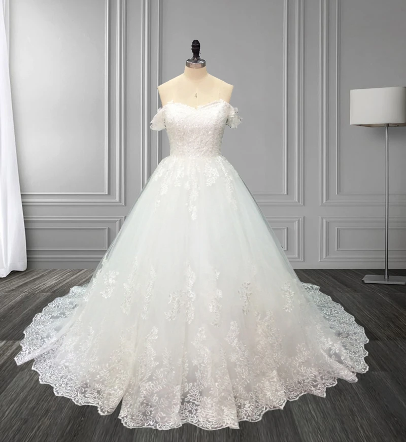 Real Photos White Ivory Vestido de Noiva 2019 Ball Gown Wedding Dress Princess Off Shoulder Beads Applique Lace Robe De Mariee
Real Photos White Ivory Vestido de Noiva 2019 Ball Gown Wedding Dress Princess Off Shoulder Beads Applique Lace Robe De Mariee