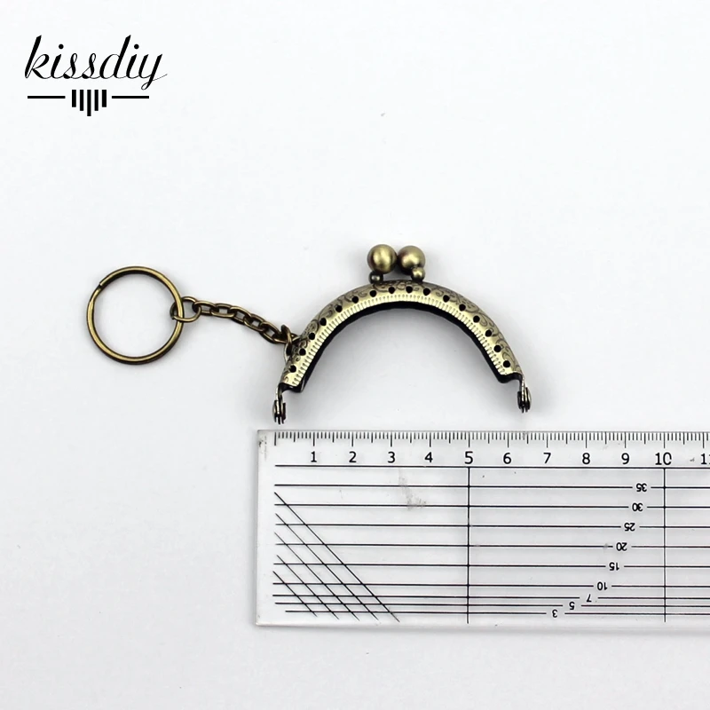 20pcs/lot 6.5cm small size with keyring Antique bronze Metal Purse Frame for coin purse Making DIY bags accessory,freeshipping
20pcs/lot 6.5cm small size with keyring Antique bronze Metal Purse Frame for coin purse Making DIY bags accessory,freeshipping