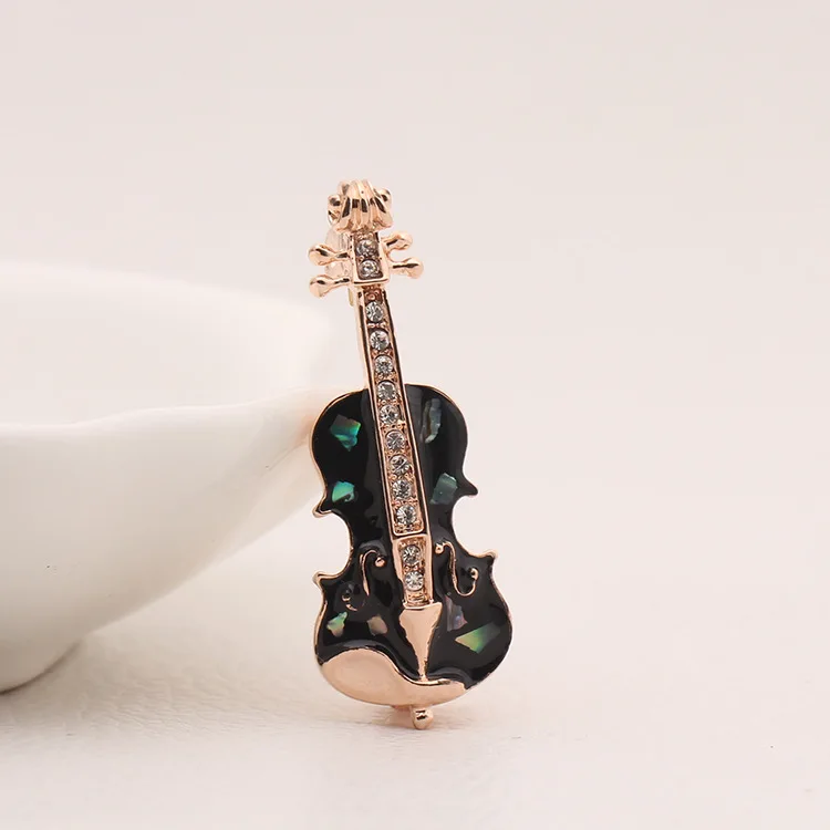 New minimalist CZ brooch personality all-match oil violin male and female pin Size 3.9*1.5CM
New minimalist CZ brooch personality all-match oil violin male and female pin Size 3.9*1.5CM