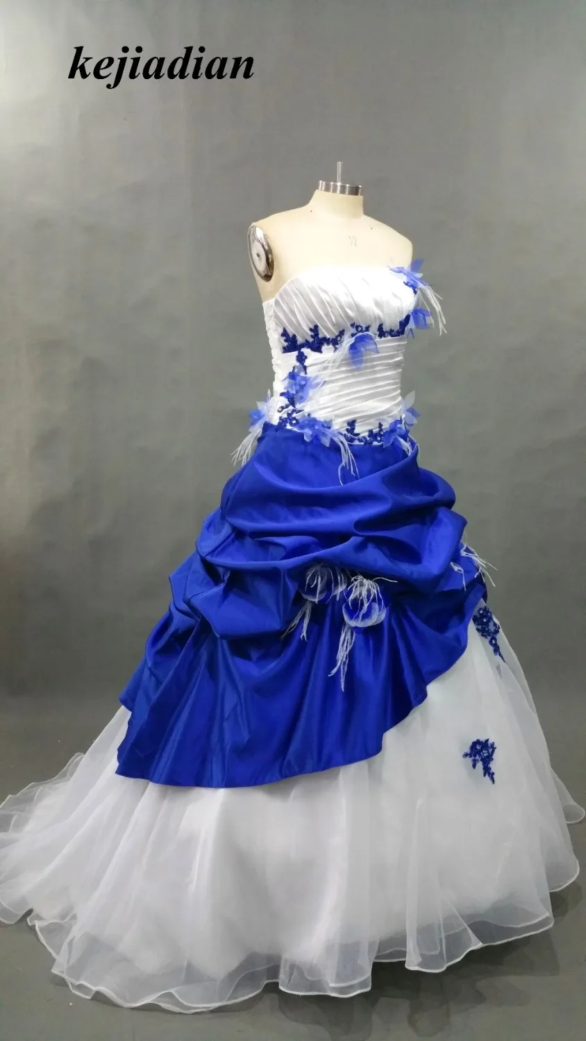 Royal Blue and White Gothic Wedding Dresses Ball Gown Satin Robe De Mariage Lace Appliques feathers Bride Wedding Gowns
Royal Blue and White Gothic Wedding Dresses Ball Gown Satin Robe De Mariage Lace Appliques feathers Bride Wedding Gowns