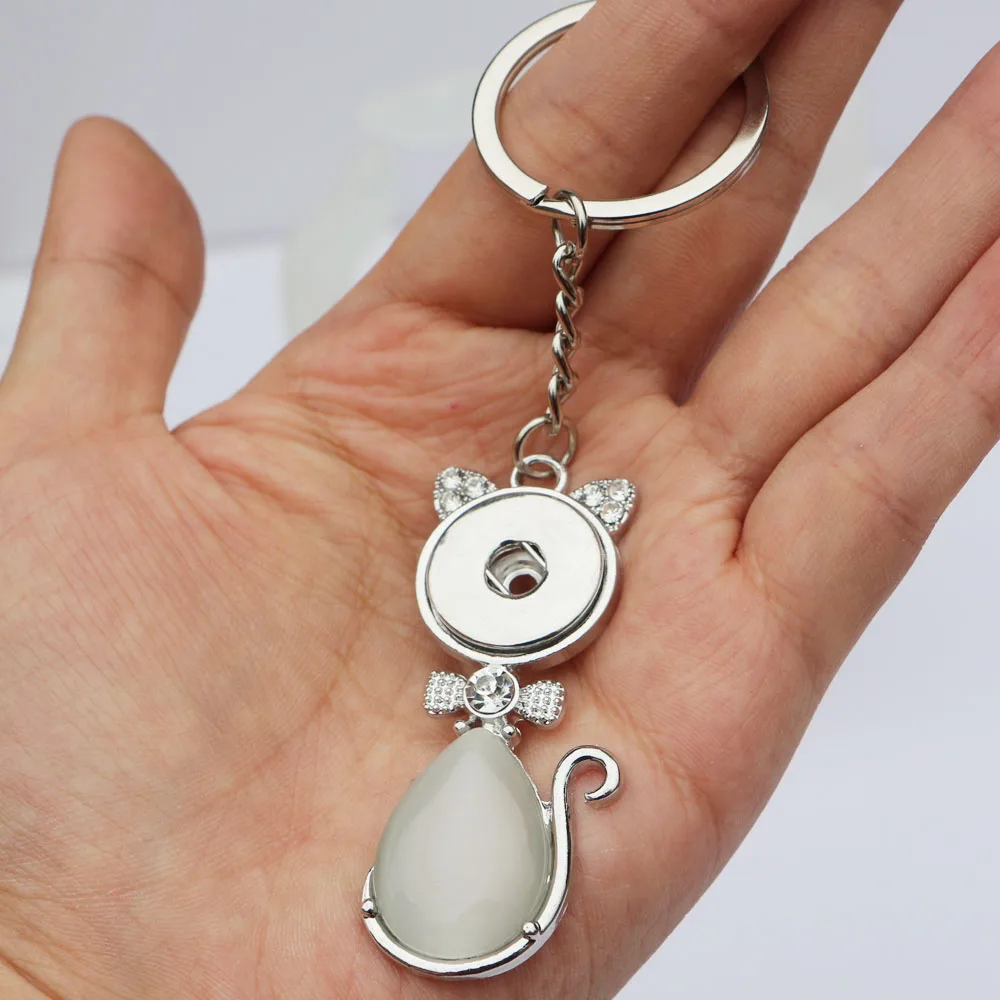 New Lovely Cat Shape Snap Button Pendant Keyring With Cat Eye 18mm Diy Snap Button Key Chains Jewelry For Men EKR010
New Lovely Cat Shape Snap Button Pendant Keyring With Cat Eye 18mm Diy Snap Button Key Chains Jewelry For Men EKR010