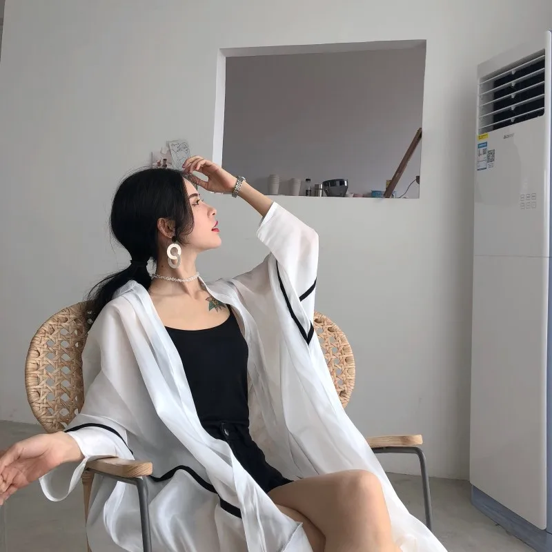 white chiffon blouses and shirts women summer loose plus size long sun-protective clothing blouses and shirts large size2018
white chiffon blouses and shirts women summer loose plus size long sun-protective clothing blouses and shirts large size2018