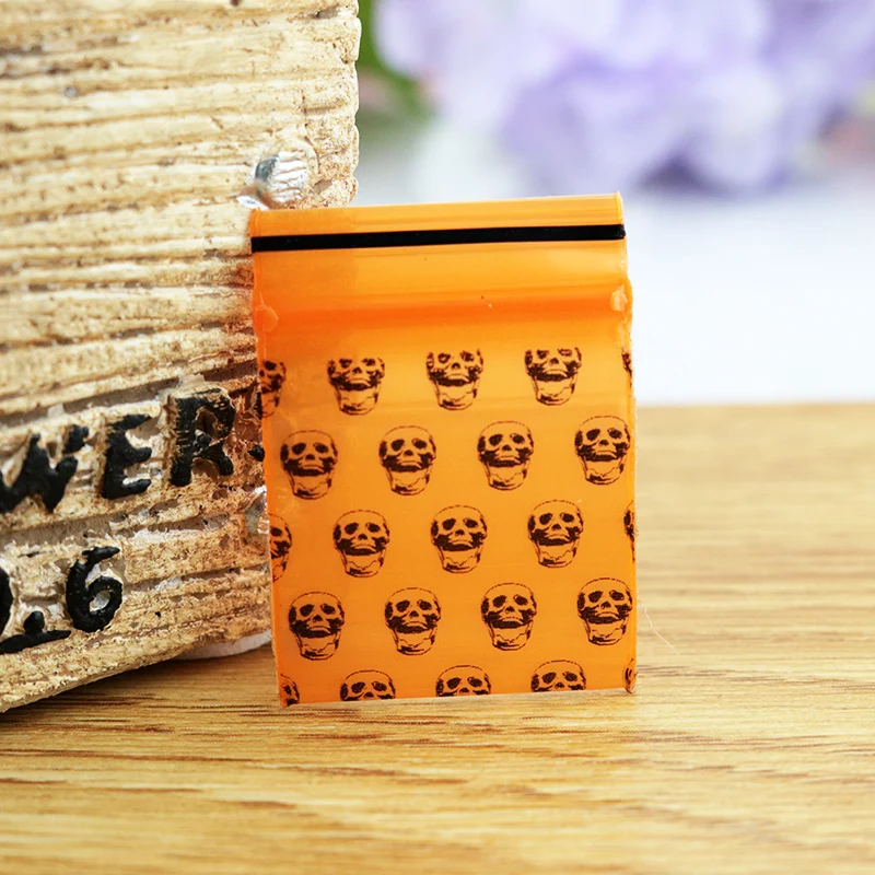 Thick Plastic Gift Jewelry Bag Hot Sale 300pcs Mini Self Sealing Zip Lock Plastic Bags 3.5*5cm Orange Skull Printing Bag
Thick Plastic Gift Jewelry Bag Hot Sale 300pcs Mini Self Sealing Zip Lock Plastic Bags 3.5*5cm Orange Skull Printing Bag