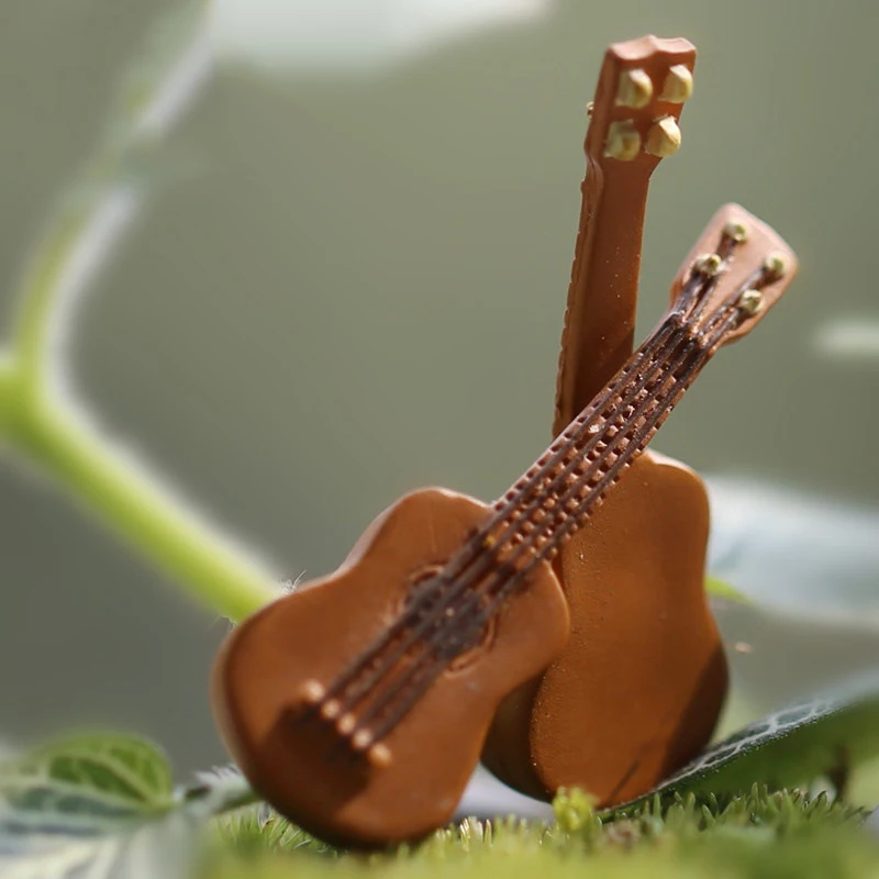 ZOCDOU 1 Piece Mini Guitar Instrument Small Statue Figurine Little Crafts Ornament Figure Miniatures DIY Home Room Desk Decor
ZOCDOU 1 Piece Mini Guitar Instrument Small Statue Figurine Little Crafts Ornament Figure Miniatures DIY Home Room Desk Decor