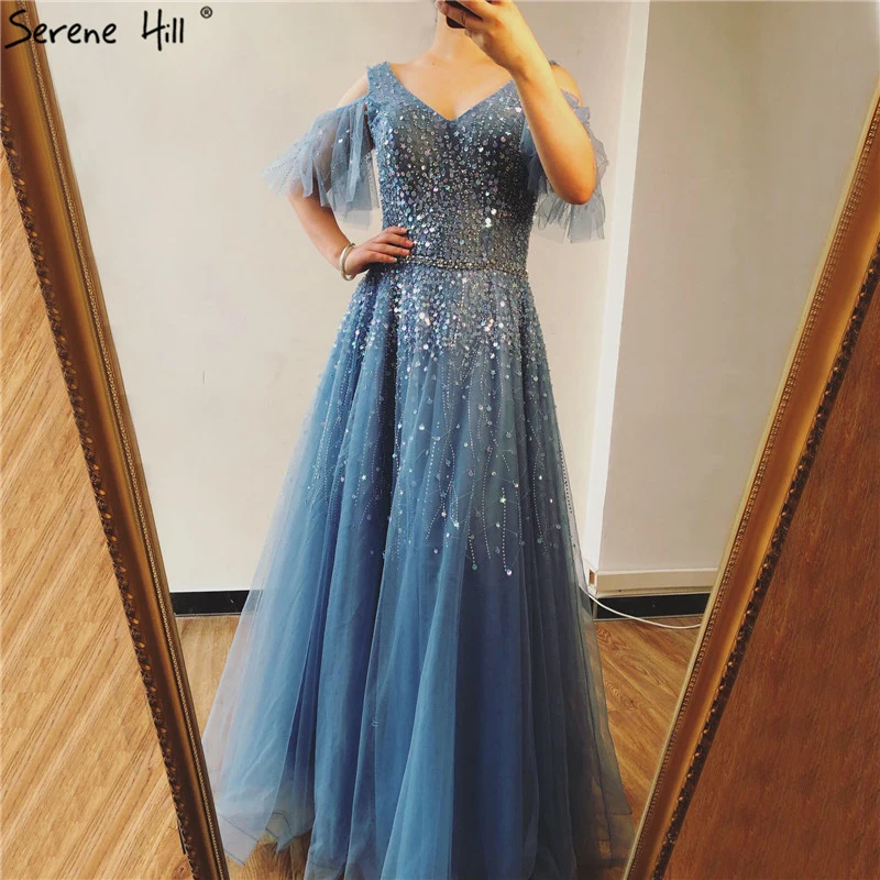 Dubai Design Blue V-Neck Sexy Prom Dresses 2019 A-Line Beading Sequined Sparkle Prom Gowns Real Photo BLA70075 
Dubai Design Blue V-Neck Sexy Prom Dresses 2019 A-Line Beading Sequined Sparkle Prom Gowns Real Photo BLA70075
