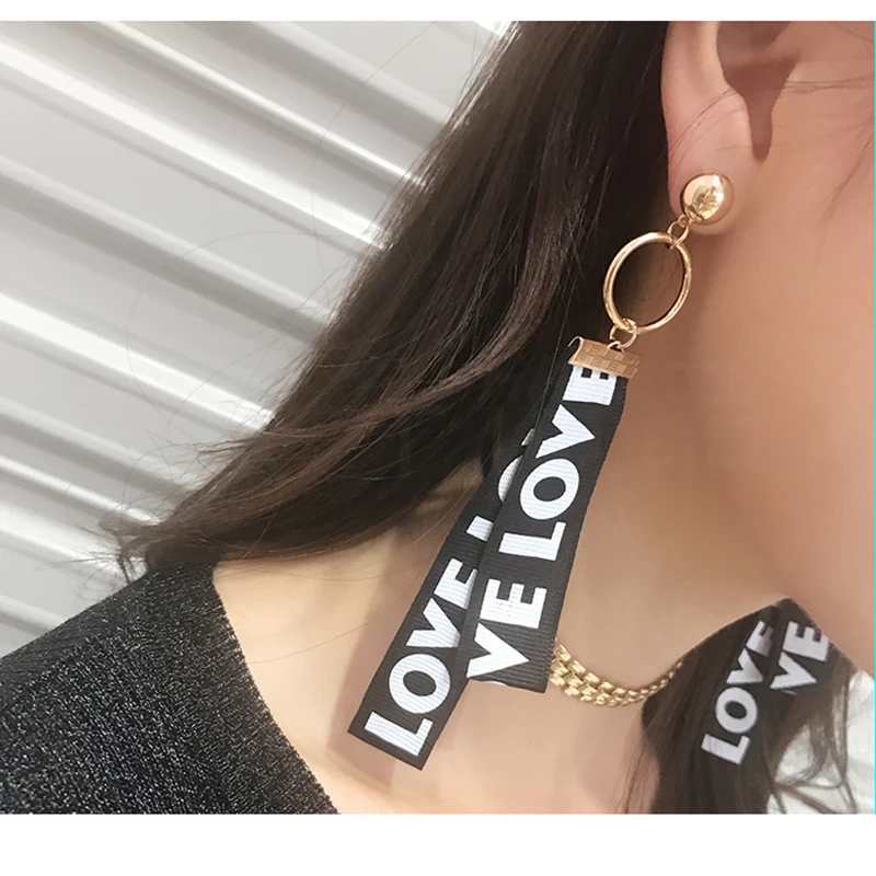 SUKI Korean Creative Letter Ribbon Long Dangle Love Earrings for Women Multilayer Asymmetric Drop Earrings Brincos Ear Jewelry
SUKI Korean Creative Letter Ribbon Long Dangle Love Earrings for Women Multilayer Asymmetric Drop Earrings Brincos Ear Jewelry