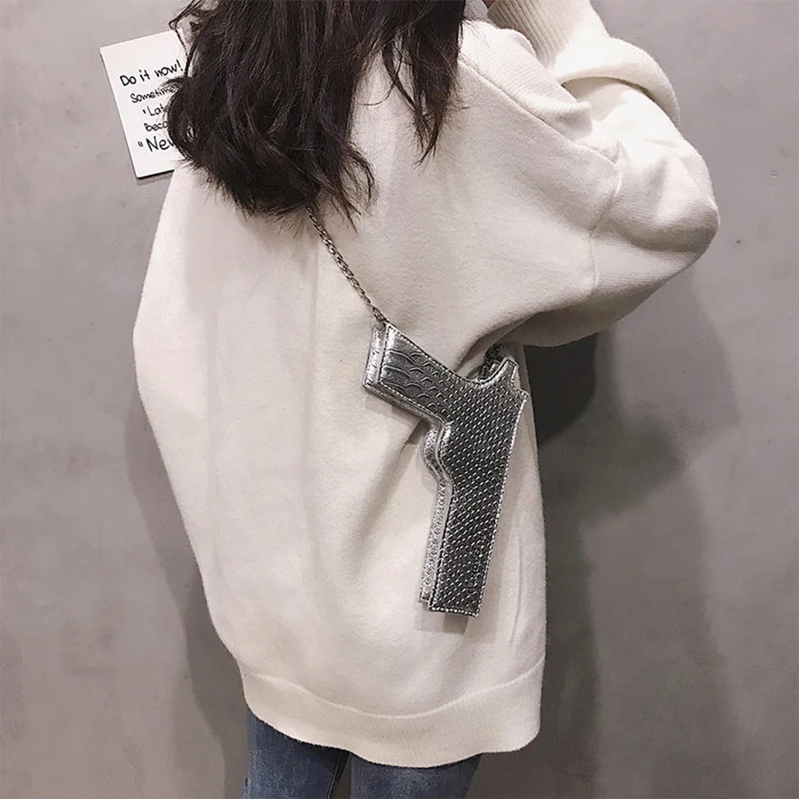 Women Mini Pistol-shaped Messenger Bag Harajuku Pu Leather Crossbody Bags For Women Chains Party Bolsa Girl Solid Small Flap Bag
Women Mini Pistol-shaped Messenger Bag Harajuku Pu Leather Crossbody Bags For Women Chains Party Bolsa Girl Solid Small Flap Bag