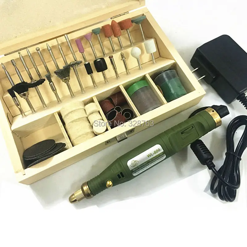 electric mini drill +100pcs grinding accessories bag+adapter Multifunction Engraving machine Electric tool set kit Free Shipping
electric mini drill +100pcs grinding accessories bag+adapter Multifunction Engraving machine Electric tool set kit Free Shipping