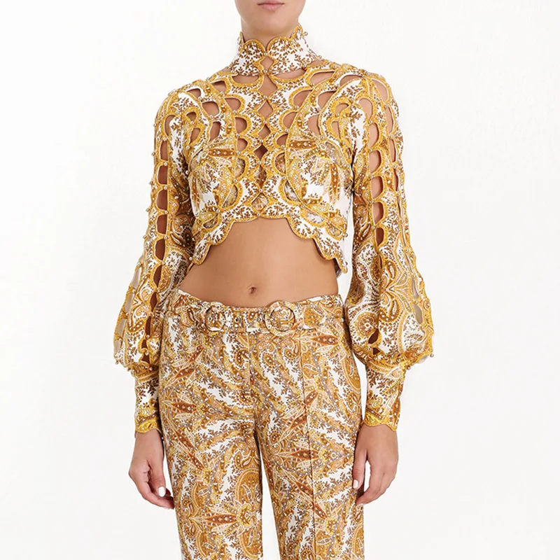 2019 Runway Designer Hollow Out Rivet Woman Gold Tops High Waist Lantern Sleeve Print Short Slim Tops Elegant Vacation Shirts
2019 Runway Designer Hollow Out Rivet Woman Gold Tops High Waist Lantern Sleeve Print Short Slim Tops Elegant Vacation Shirts