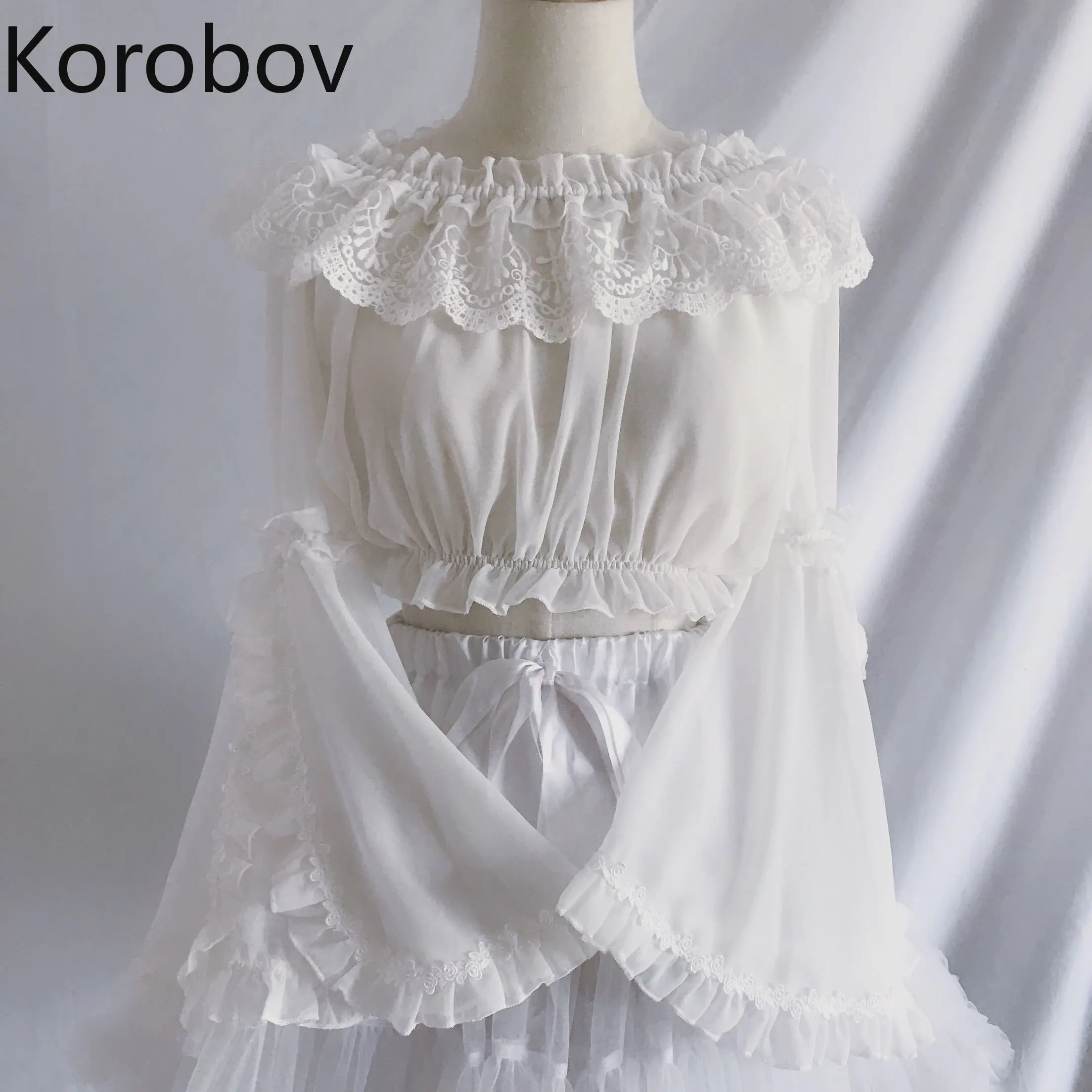 Korobov Lolita Lace Ruffles Blouse Women Flare Long Sleeve Slash Neck off Shoulder Crop Tops Shirt Short Chiffon Blusas 77602
Korobov Lolita Lace Ruffles Blouse Women Flare Long Sleeve Slash Neck off Shoulder Crop Tops Shirt Short Chiffon Blusas 77602