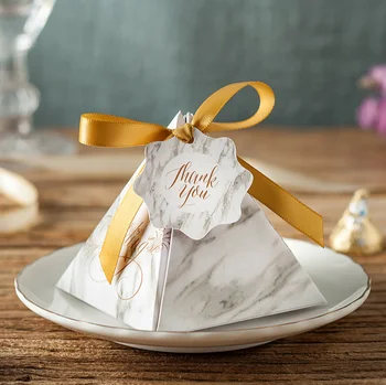 100Pcs Creative Floral Triangular Pyramid Wedding Favors Candy Boxes Bomboniera Party Supplies Gift Box Chocolate Box
100Pcs Creative Floral Triangular Pyramid Wedding Favors Candy Boxes Bomboniera Party Supplies Gift Box Chocolate Box