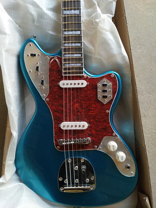The factory exports Blue silver electric guitar Red guard Silver fittings Real photos free delivery
The factory exports Blue silver electric guitar Red guard Silver fittings Real photos free delivery