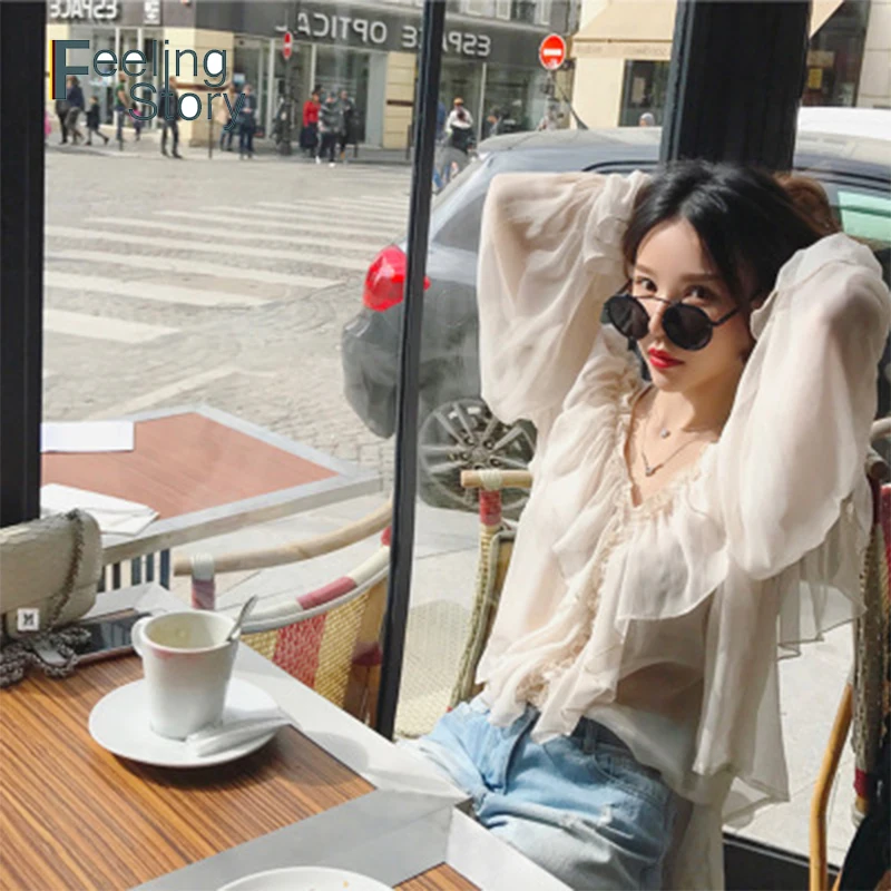 Chiffon Womens Sexy Summer Tops and Blouses See Through Top Women's Long Sleeve Multi-layer Lotus Leaf Shirts Blusas Femininas
Chiffon Womens Sexy Summer Tops and Blouses See Through Top Women's Long Sleeve Multi-layer Lotus Leaf Shirts Blusas Femininas