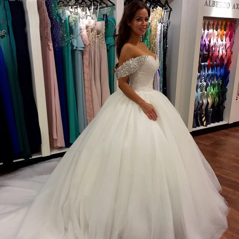 robe de mariage Sweetheart Pearls Beading Patterns Ball Gown Cap Sleeves Sexy Luxury Wedding Party Dress
robe de mariage Sweetheart Pearls Beading Patterns Ball Gown Cap Sleeves Sexy Luxury Wedding Party Dress