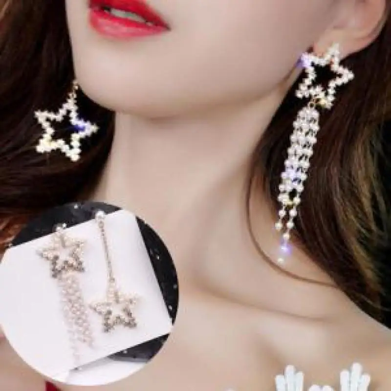 Asymmetrical earrings with five-pointed star tassel long earrings temperament personality crystal hot sell jewelry wholesale
Asymmetrical earrings with five-pointed star tassel long earrings temperament personality crystal hot sell jewelry wholesale